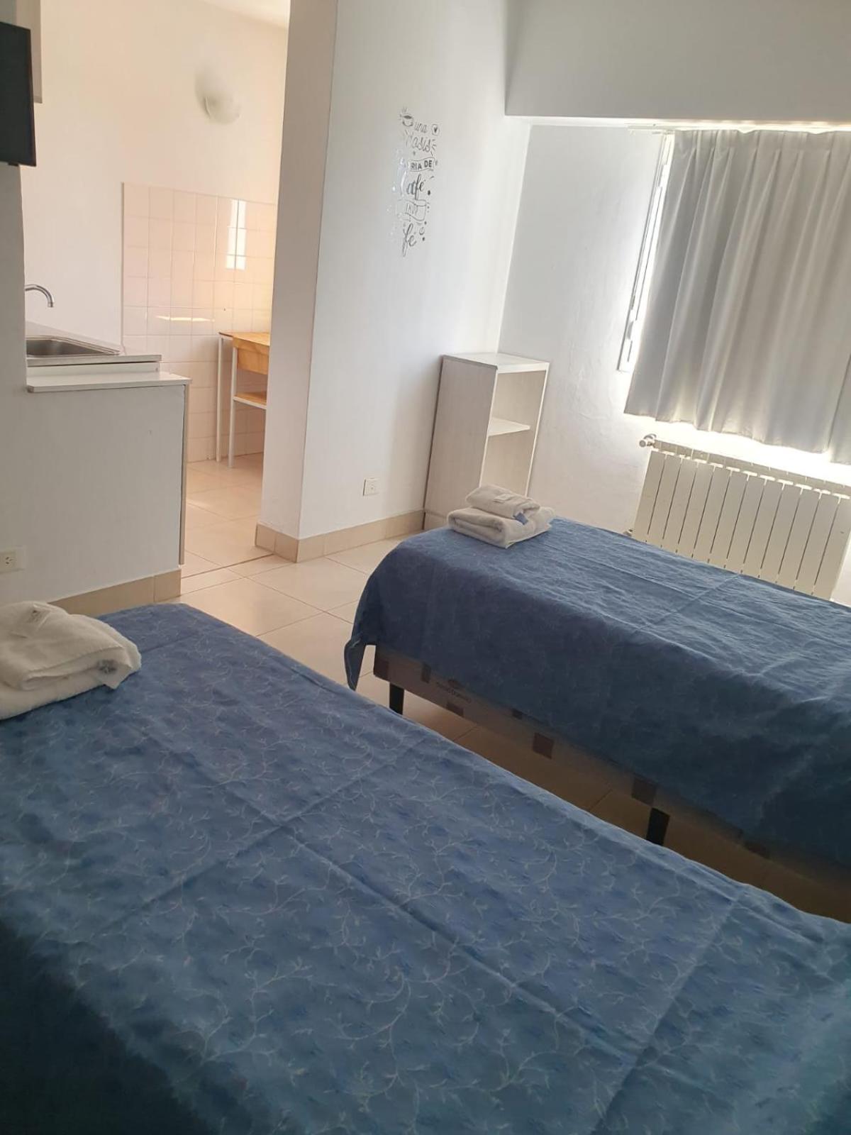 بويرتو مادرين Apart Hotel Marina المظهر الخارجي الصورة